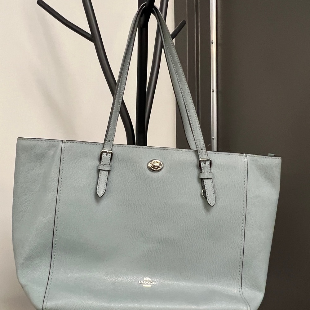 Large blue Coach tote. Makeup stains inside